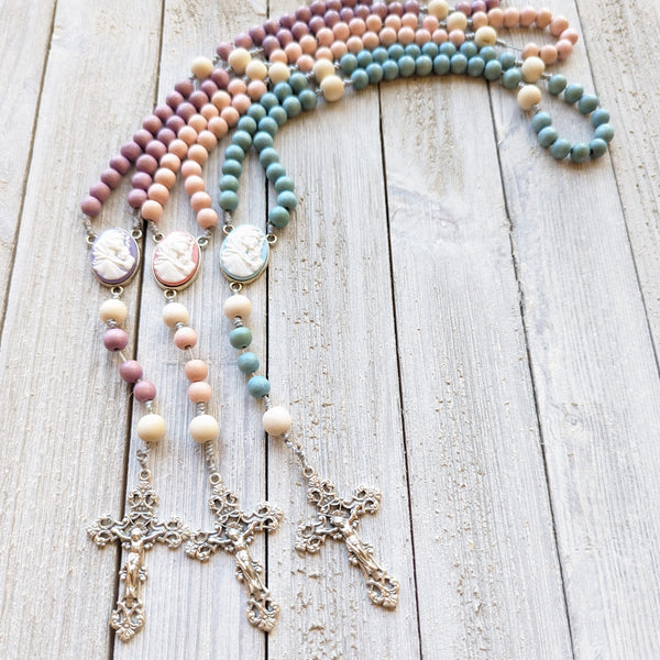 Pastel Corded Blessed Mother Rosary with painted wood beads, nylon cording, scultured resin center