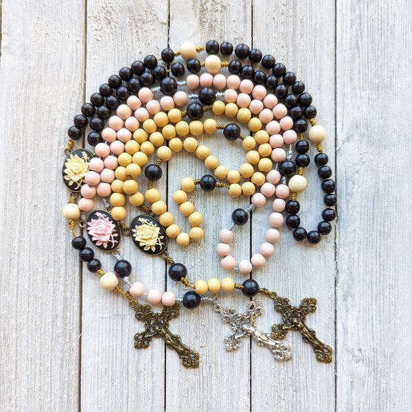 Corded Rose Rosary with painted wood beads, nylon cording, scultured resin center