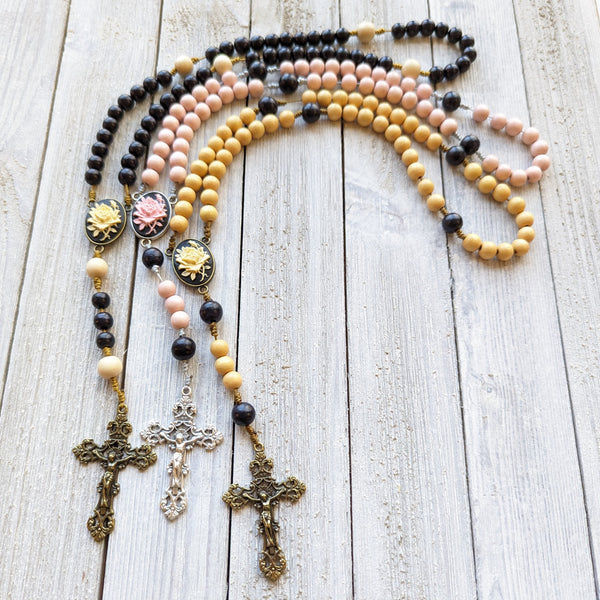 Corded Rose Rosary with painted wood beads, nylon cording, scultured resin center