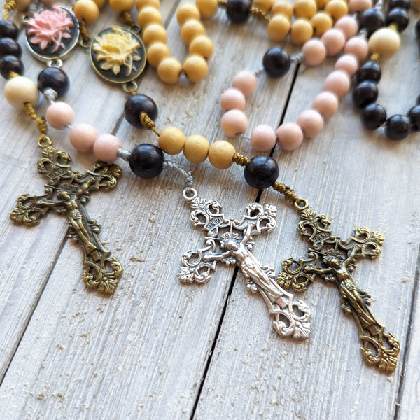 Corded Rose Rosary with painted wood beads, nylon cording, scultured resin center