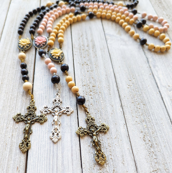 Corded Rose Rosary with painted wood beads, nylon cording, scultured resin center